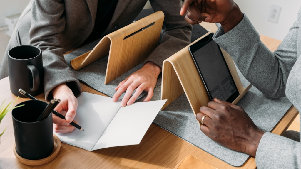 Business team working together with Apple devices